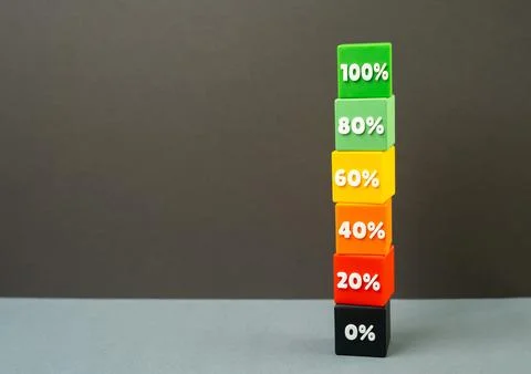 Efficiency scale as a tower of blocks with percentages, work progress conce.. Stock Photos