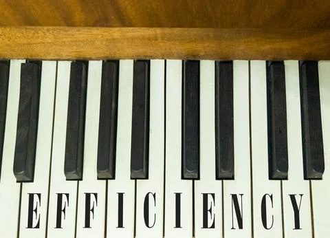 Efficiency symbol. Concept word Efficiency on beautiful keys of the old ret.. Stock Photos