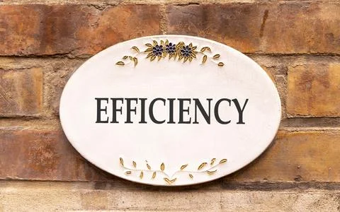 Efficiency symbol. Concept word Efficiency on beautiful white marble sign p.. Stock Photos