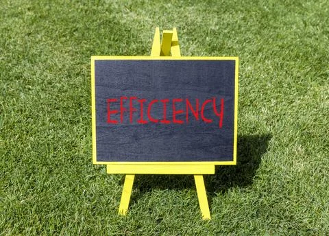 Efficiency symbol. Concept word Efficiency on beautiful black blackboard. B.. Stock Photos