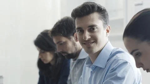 Efficient business team working at office desk Stock Footage 108421625