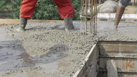 Efficient Cement Mixing  Expert Cement Worker at Work Stock Footage 327542293
