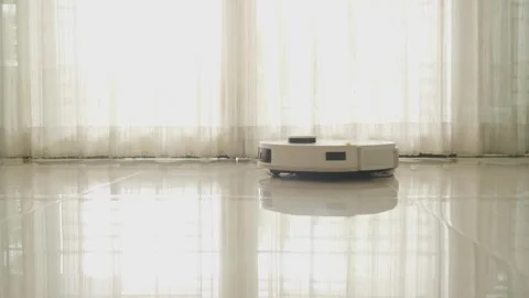 Efficient Cleaning Robot in Bright Room Home Maintenance Technology Stock-Footage 308790860