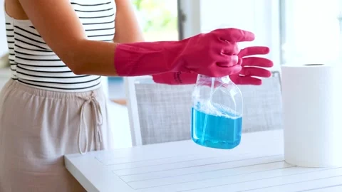 Efficient Cleaning Routine with Spray and Towel Stock Footage 307162105