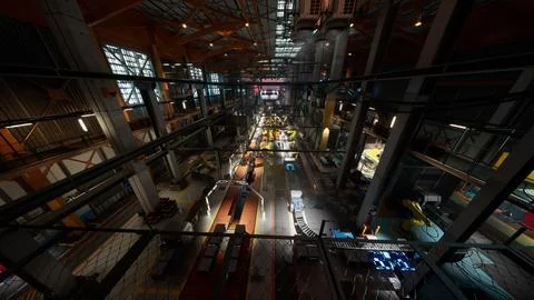 Efficient conveyor system operating in a factory workshop during daylight イラスト素材