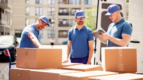 Efficient Courier Delivery and Professional Movers Near Van: A Group Stock Footage 278697183