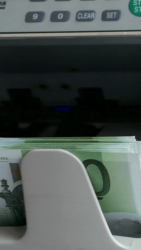 Efficient Currency Counter Sorting 100 Euro Banknotes On A Wooden Surface 스톡 동영상 302553232