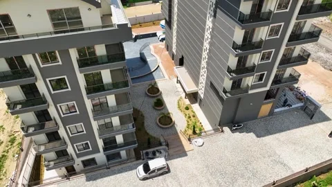 Efficient Development: Aerial View of Rapidly Constructed Homes and Complexes Stock Footage 243185908