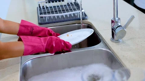 Efficient Dishwashing Routine in Modern Kitchen Stock Footage 307814110