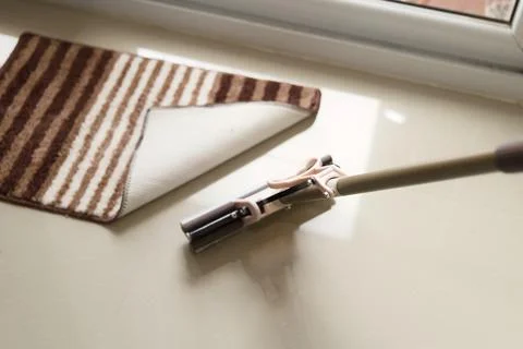 Efficient Floor Cleaning With Mop on Shiny Tile Surface Stock Photos