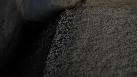 Efficient Grain Sorting - A Close-up Look at Rice Mills in Action Stock Footage 324042460