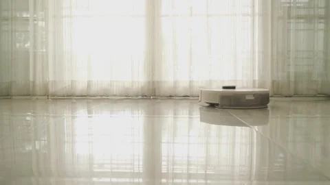 Efficient Home Maintenance Cleaning Robot Tidies Up Bright Room with Sunlight Stock-Footage 308790868