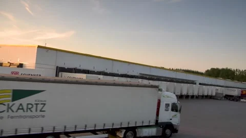 Efficient Logistics at DB Schenker Warehouse During Sunset Video stock 318203994