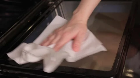 Efficient Oven Cleaning Made Simple with Advanced Steam Technology for Your Stock Footage 319896131