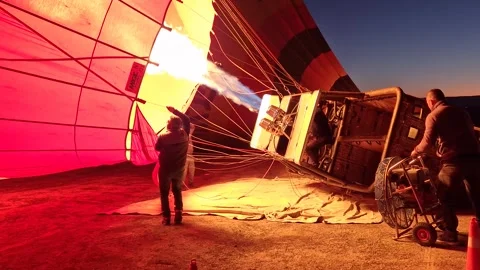 Efficient preparations for a hot air balloon ride in progress. Stock Footage 262887404
