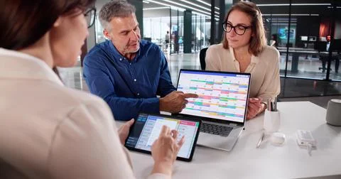 Efficient Project Manager Using Task Software On Laptop For Scheduling. Stock Photos