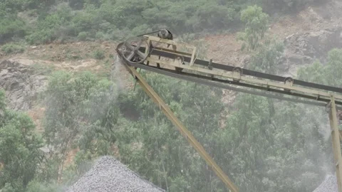 Efficient Rock Crushing - Optimized Industrial Machine in Action Stock Footage 314446062