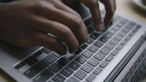 Efficient typing techniques on a laptop keyboard for improved productivity Stock Footage 312577902