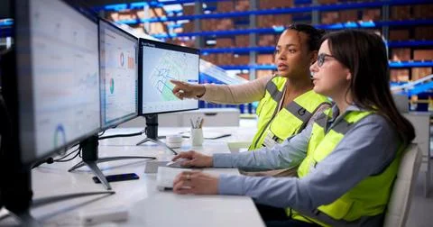 Efficient Warehouse Management Using Computer Automation And Logistic Solutio Stock Photos