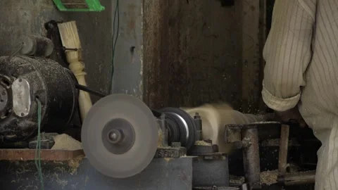 Efficient Woodworking - A Close-Up Look at the Spinning Action of a Wood Lathe Stock Footage 314473560