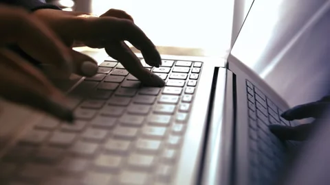 Efficient Work Environment: Woman, Laptop, Flowing Curtains Stock Footage 255336542