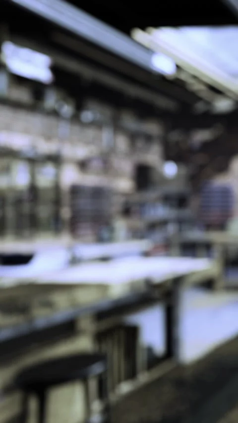 Efficient workers prepare items in a busy warehouse for shipment at noon Stock Footage 332211848