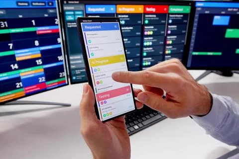 Efficiently Manage Employee Schedules Using Virtual Calendar Software On Desk Stock Photos