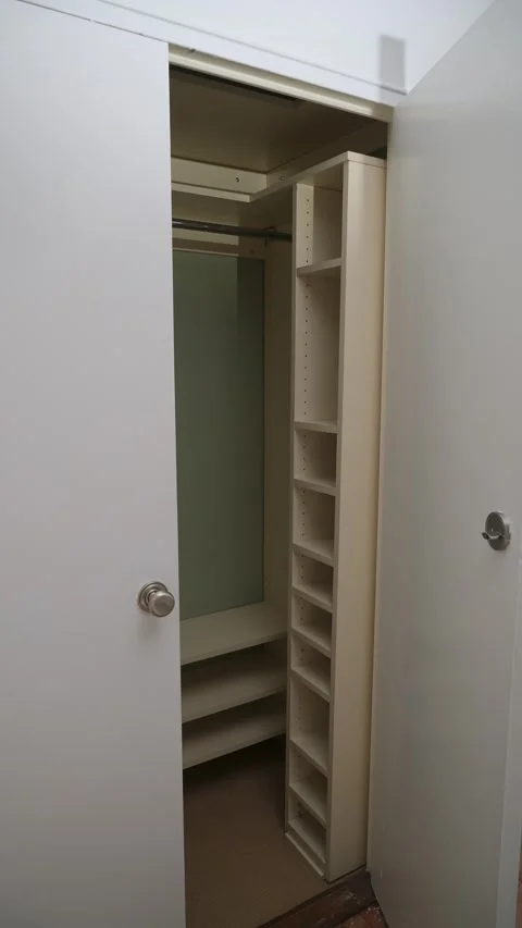 Efficiently Organized Minimalist Closet Featuring Clever Shelving Chic Storage Stock Footage 295731181