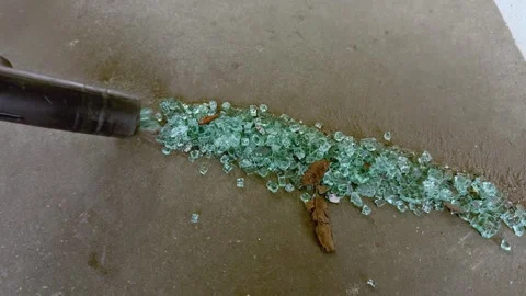 Efficiently vacuuming broken glass from a workfloor Stock Footage 321481080