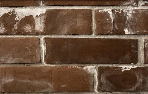 Efflorescences on brickwork, plaque on wall and bricks. Close-up of an old brick Stock-Fotos