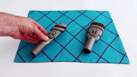 Effortless Cleaning: Vacuum Brush Attachments in Close Focus Video stock 313469623