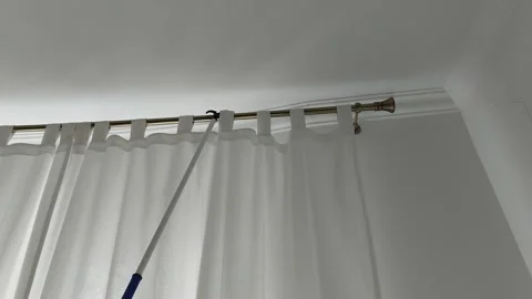 Effortless Curtain Styling on Cornices Stock Footage 306062846