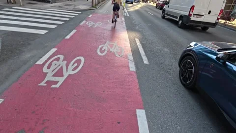Effortless Daily Commute in Brussels On A Bicycle Moving Smoothly Along A Stock Footage 340542904