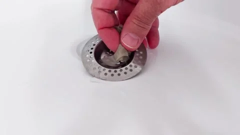 Effortless Drain Cleaning: Strainer Method in Action Stock-Footage 308300603
