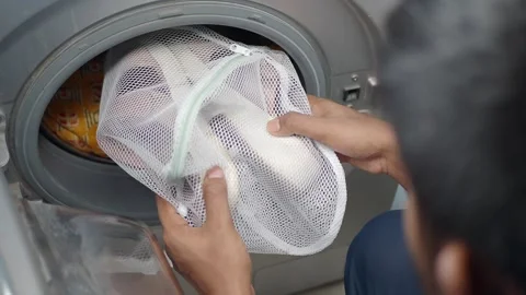 Effortless laundry tips for fresh and clean shoes Stock Footage 339120762