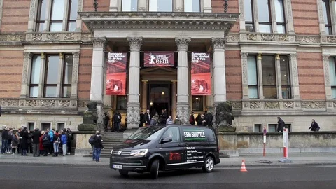 EFM Shuttle during Berlinale drives away from Film Market in slow motion while Stock Footage 127338108