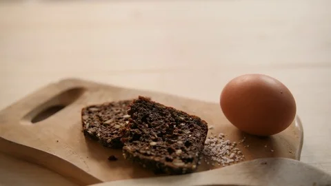 Egg and bread on board Stock-Footage 84712284
