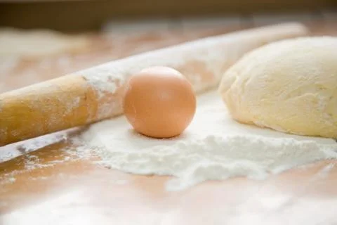 Egg and dough Stock Photos