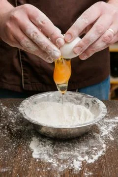 Egg and flour baking process on table 스톡 사진