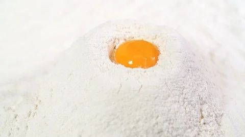 Egg and flour in slow motion Stock Footage 91905556