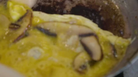 Egg and Mushroom Mixture Cooking in Frying Pan at Sydney Market Food Stall Stock Footage 345710065