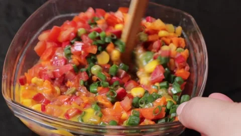 Egg and vegetable mixing in the bowl Stock Footage 158234509