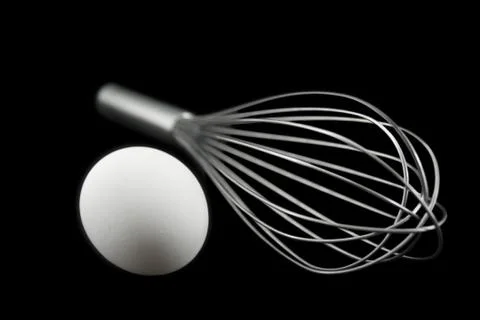 Egg and wiisk Stock Photos