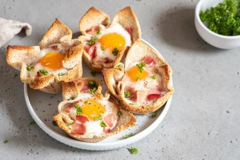 Egg, bacon and toast cup for breakfast Stock Photos