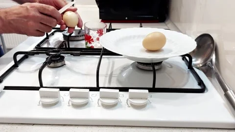 Egg Balance Hack : A Surprising Stove Trick You Need to See Stock Footage 315493478