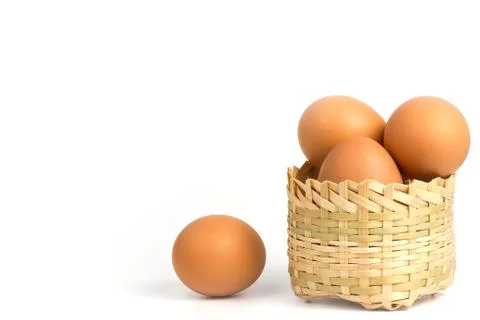 Egg in the bamboo basket. Stock Photos