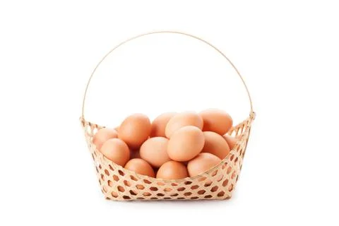 Egg in basket Stock Photos