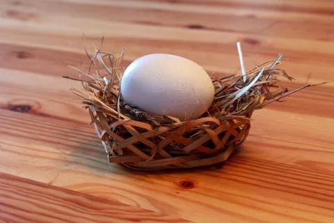 Egg in a Basket Stock Photos