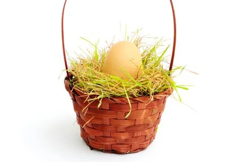 Egg in a basket Stock Photos