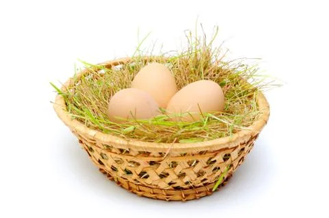 Egg in a basket Stock Photos
